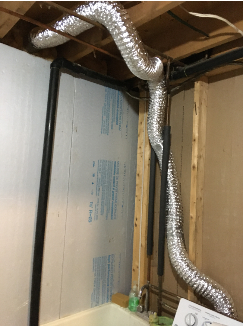 professional dryer hose replacement technician at work